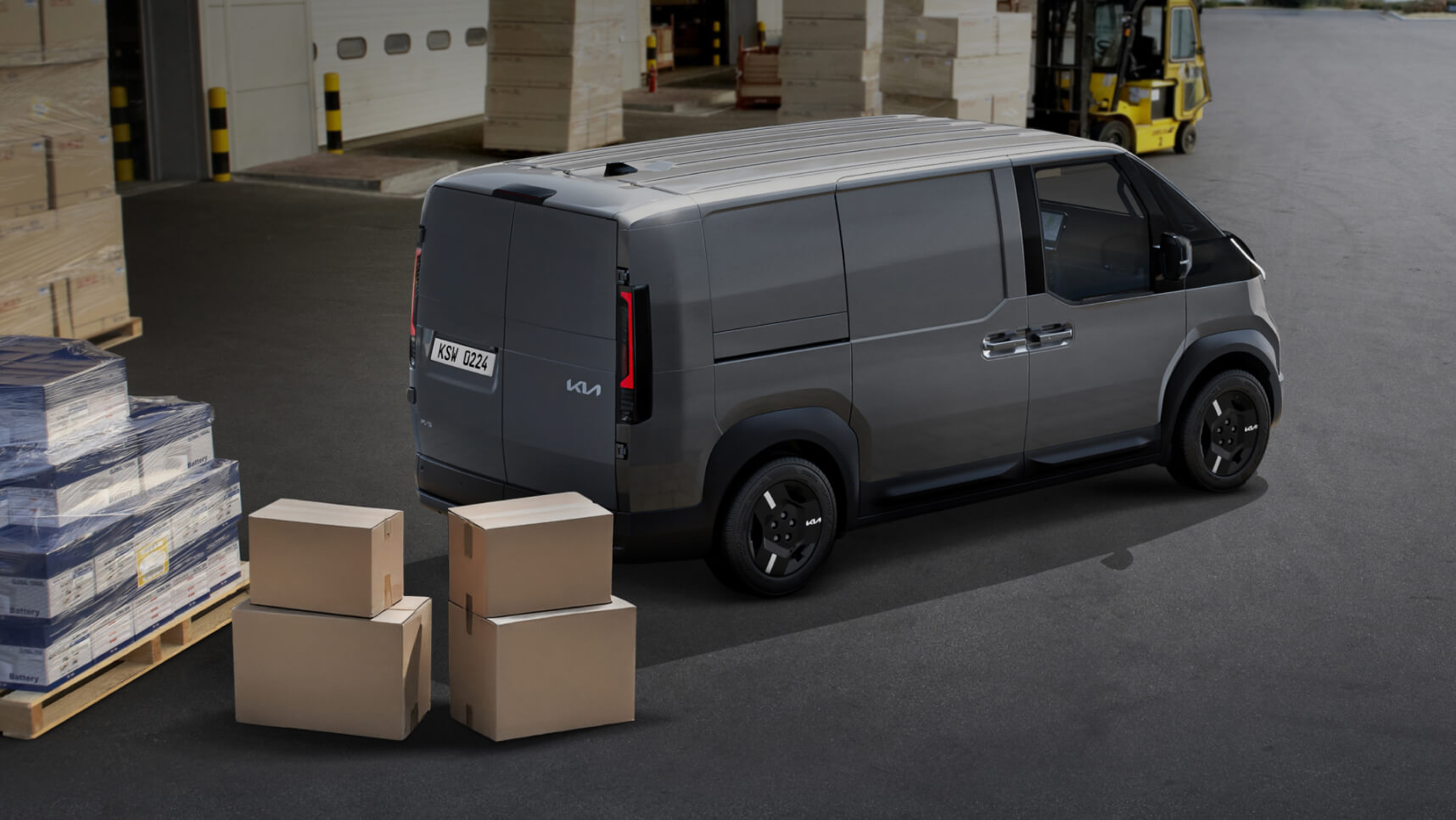 The Kia PBV Cargo model with packages positioned for loading, illustrating optimized delivery capability across body types